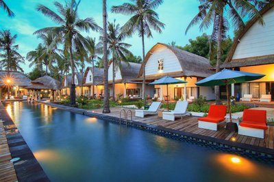 Jambuluwuk Oceano Resort Pool and Rooms Night View